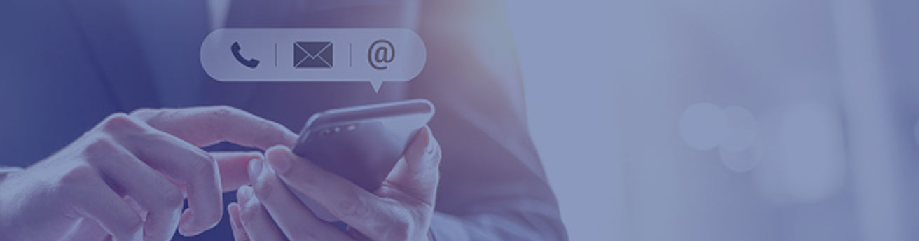 Person texting and emailing on mobile phone